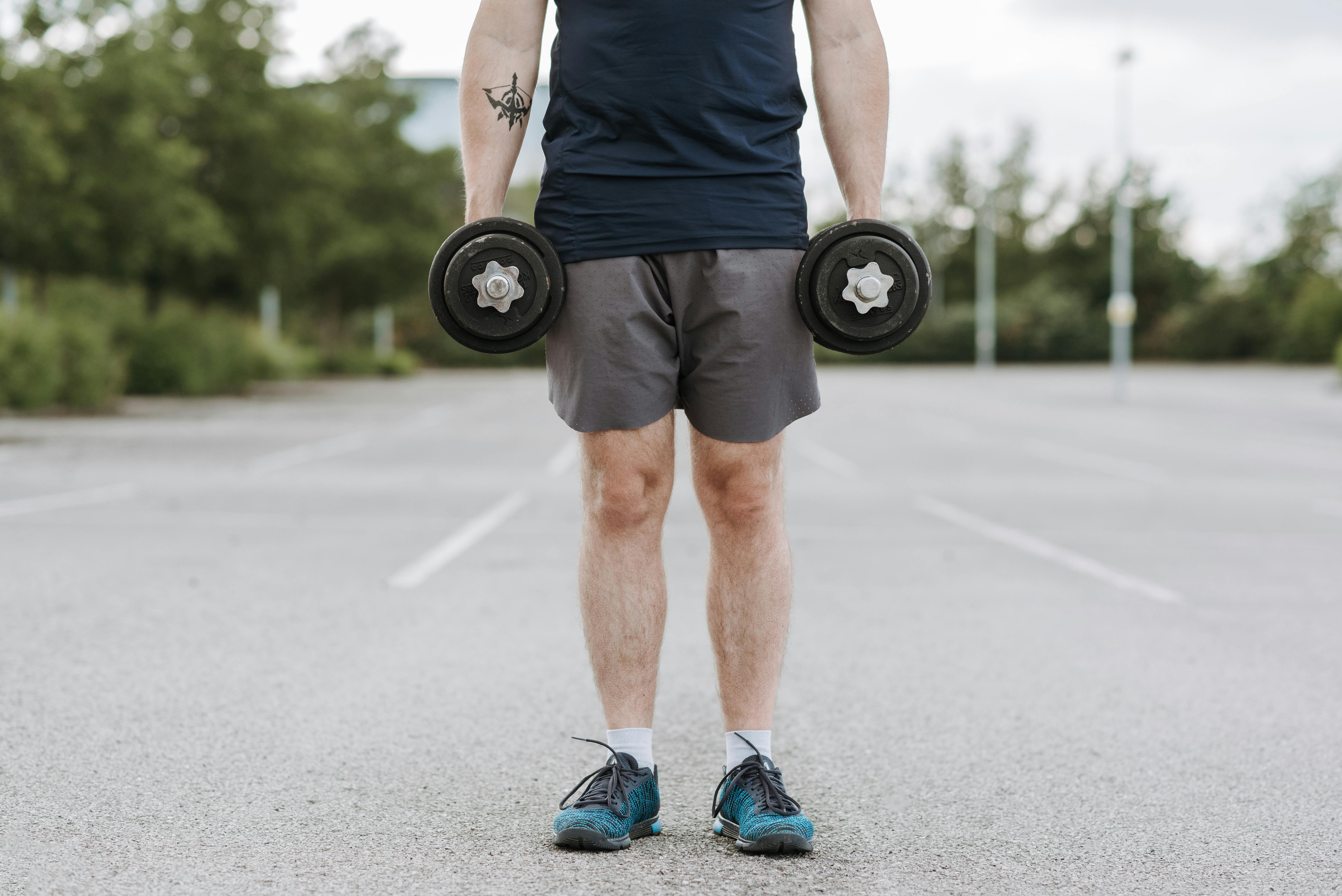 Homepage Main Image - Man Exercising with Weights